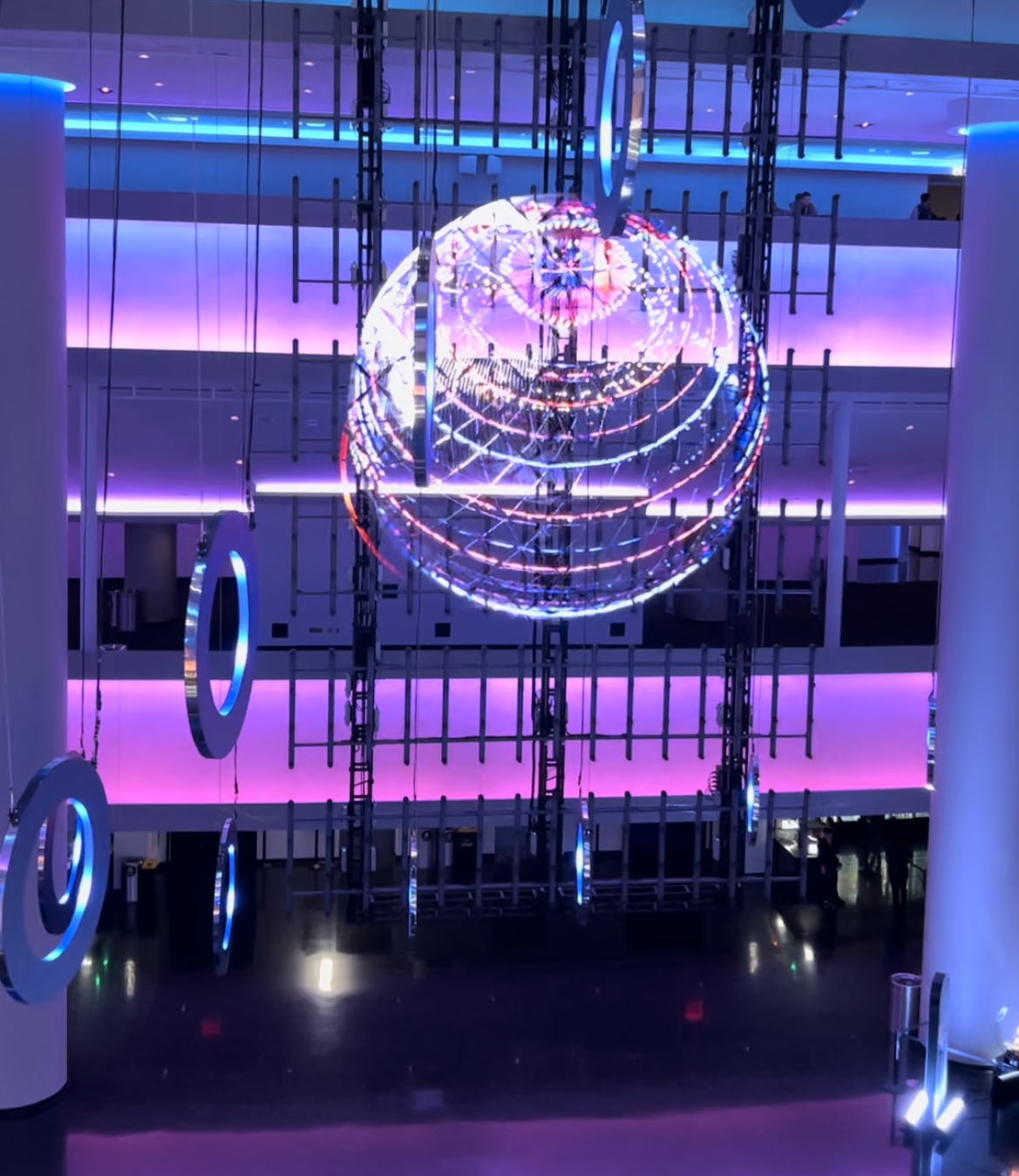 pink and blue art displays inside the las Vegas sphere 